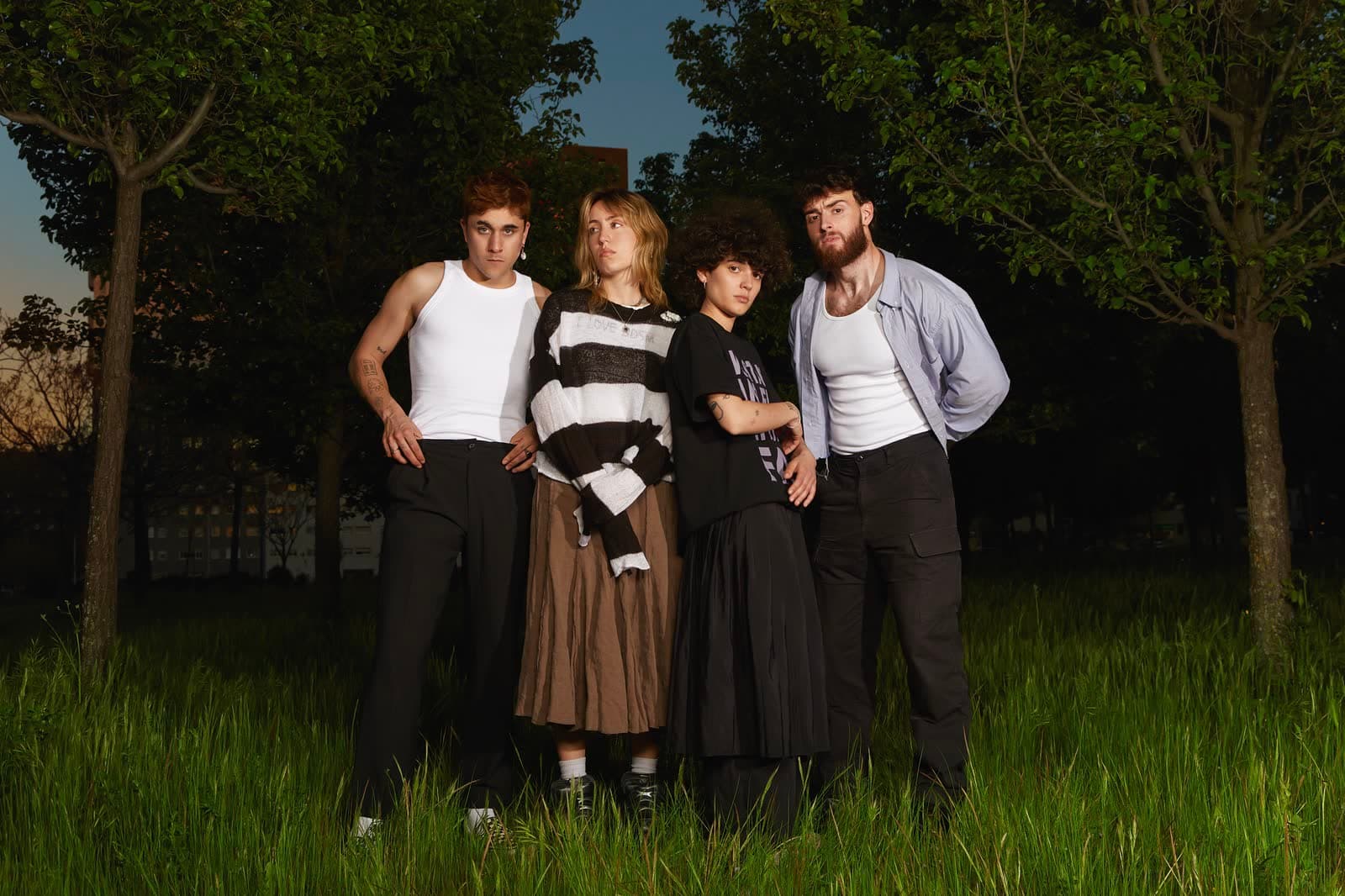 Group portrait in a field at dusk